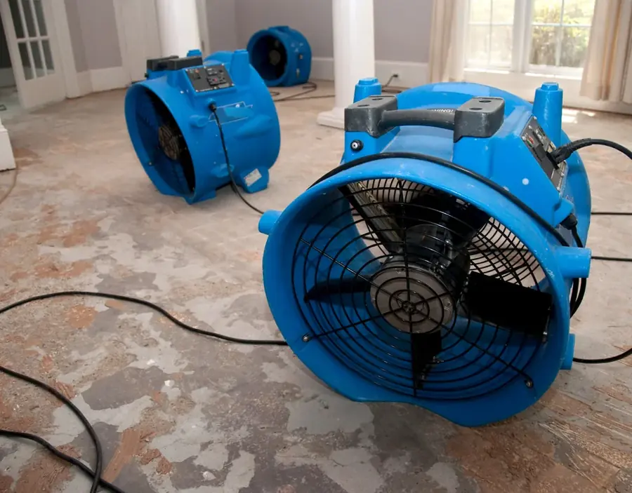 A high-volume air mover running on a floor in a Bonney Lake, WA home